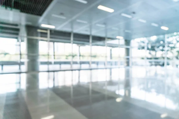 Abstract blur and defocused in empty office building with glass — Stock Photo, Image