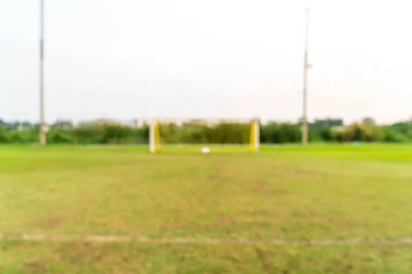 Resumen borroso objetivo de fútbol con campo de fútbol — Foto de Stock