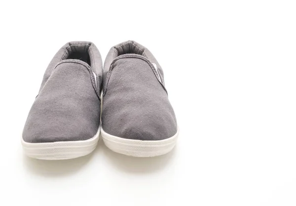 Zapatillas grises sobre fondo blanco — Foto de Stock