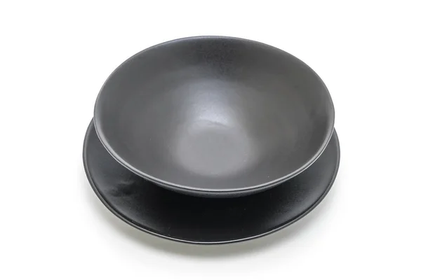 Чорна тарілка і миска ізольовані на білому тлі — стокове фото