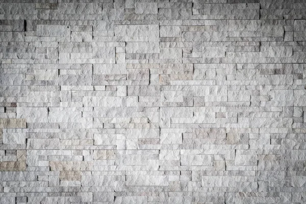 Grå tegel vägg detalj och textur — Stockfoto