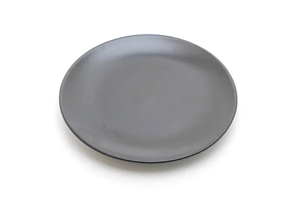Assiette et bol noirs isolés sur fond blanc — Photo