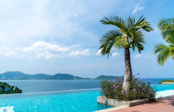 swimming pool in hotel and resort with sky and sea 