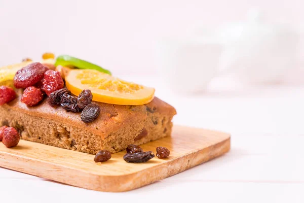 Fruit cake on wood — Stock Photo, Image