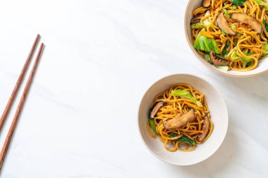 yakisoba noodles stir-fried with vegetable in asian style - vega