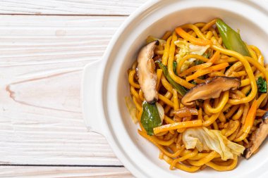 yakisoba noodles stir-fried with vegetable in asian style - vega
