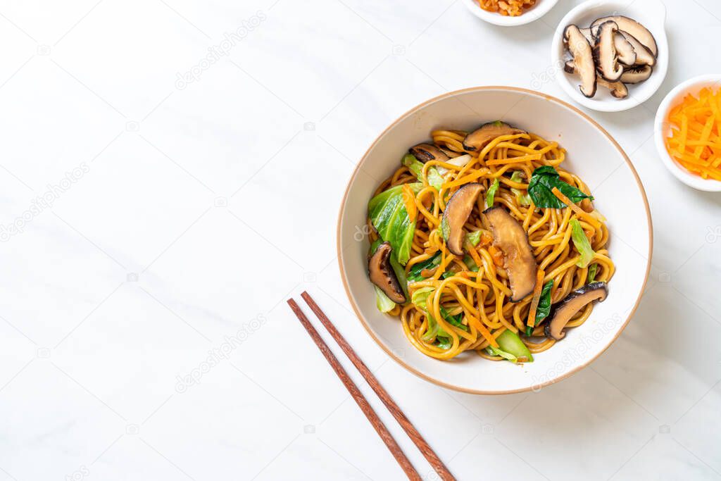 yakisoba noodles stir-fried with vegetable in asian style - vega