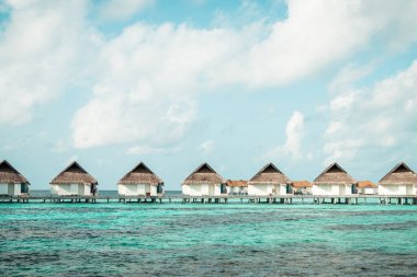 plaj ve deniz ile tropikal Maldivler tatil otel ve ada