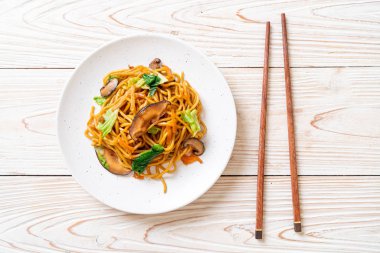 yakisoba noodles stir-fried with vegetable in asian style - vega