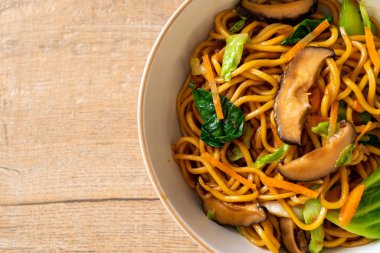 yakisoba noodles stir-fried with vegetable in asian style - vega