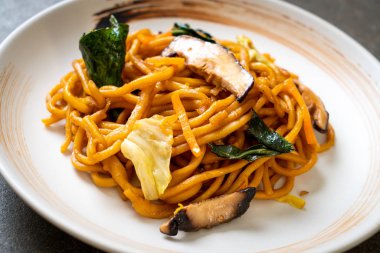 yakisoba noodles stir-fried with vegetable in asian style - vega