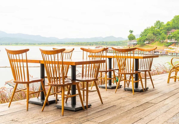 Wood table and chair in cafe restaurant — Stock Photo, Image