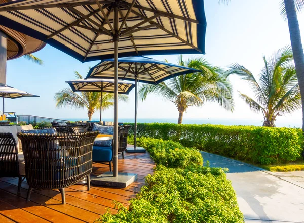 Outdoor patio deck and chair with ocean sea beach background — Stock Photo, Image