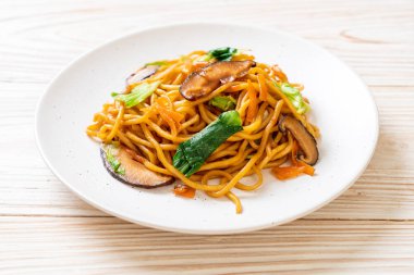 yakisoba noodles stir-fried with vegetable in asian style - vega