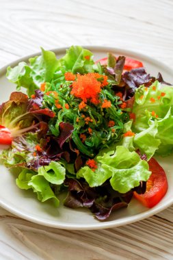 vegetable salad with Japanese seaweed and shrimp eggs 