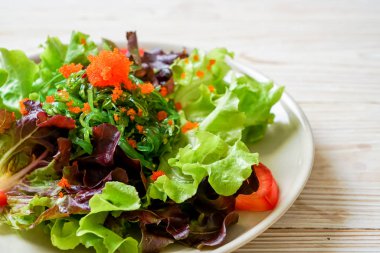 vegetable salad with Japanese seaweed and shrimp eggs 