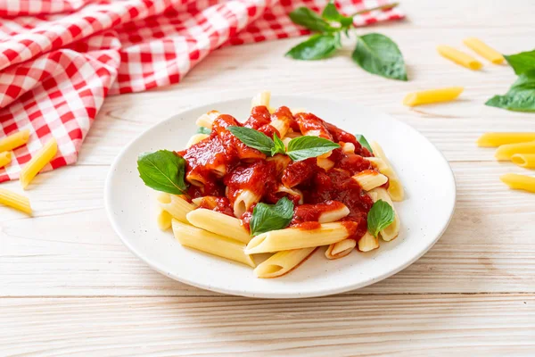 Penne pasta in tomato sauce — Stock Photo, Image