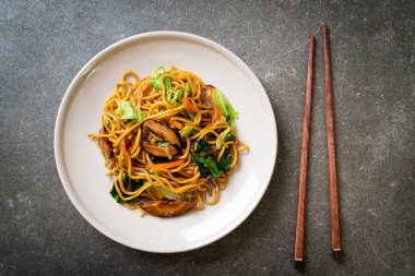 yakisoba noodles stir-fried with vegetable in asian style - vega