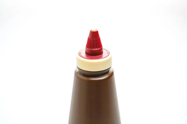 Bottiglia di salsa barbecue su sfondo bianco — Foto Stock