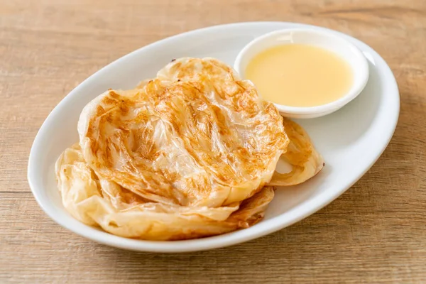 Roti with sweetened condensed milk (dessert) — Stockfoto