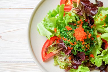 vegetable salad with Japanese seaweed and shrimp eggs 