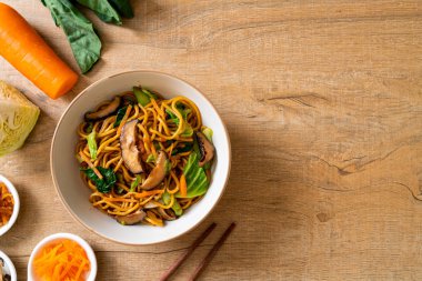 yakisoba noodles stir-fried with vegetable in asian style - vega