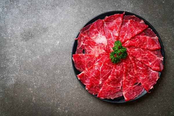 Fresh beef raw sliced with marbled texture — Stock Photo, Image