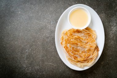 roti with sweetened condensed milk (dessert) 