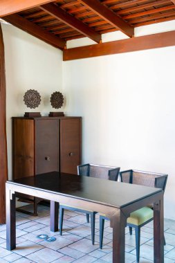 empty old and wooden chair and table