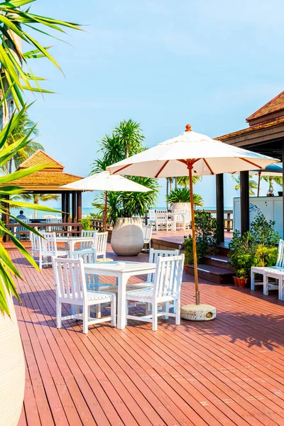 White Outdoor Patio Chair Table Umbrella — Stock Photo, Image