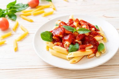 Penne pasta in tomato sauce - Italian food style clipart