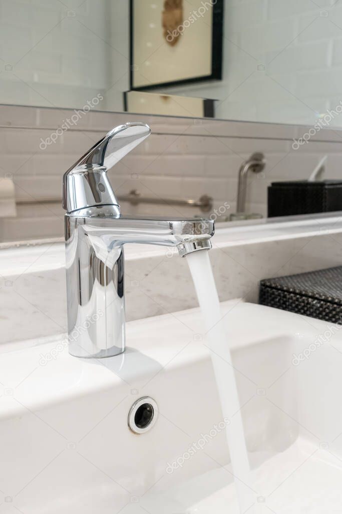 close-up tap or faucet in bathroom