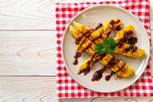grilled and barbecue corn with bbq sauce