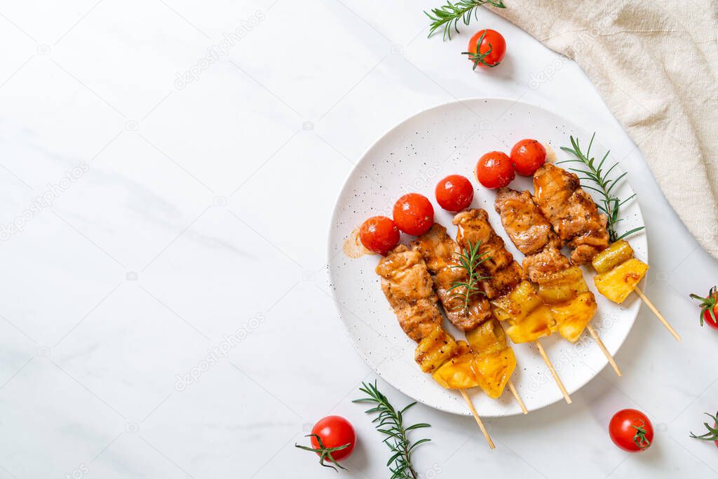 grilled pork barbecue skewer on plate