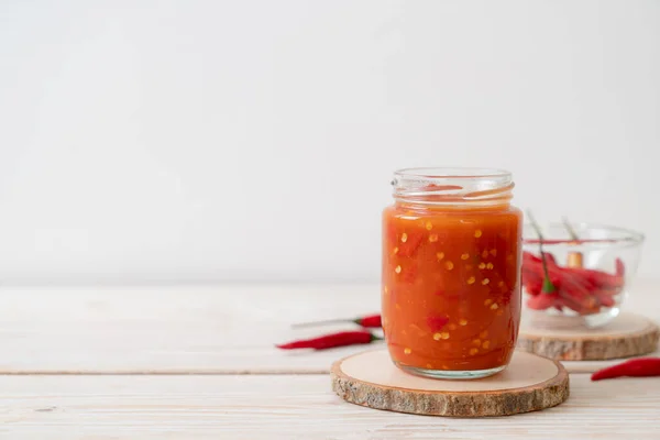 Chilli Chilli Sauce Bottle Jar Wwod Background — Stock Photo, Image