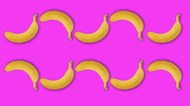 极小的运动艺术, 香蕉在玫瑰色 — 图库视频影像