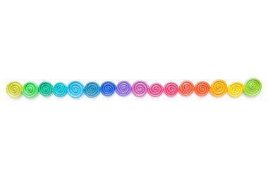 Hamuru arka plan. Plastik renkli spiraller bükülmüş 