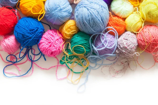 Colored balls of yarn. View from above. Rainbow colors. All colo