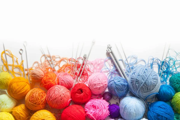 Colored balls of yarn. View from above. Rainbow colors. All colo