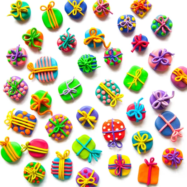 Many small gifts from plasticine — Stock Photo, Image