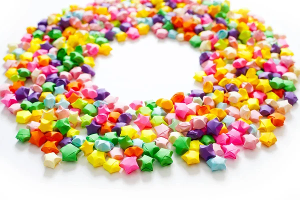 다채로운 접힌된 종이 스타 또는 프레임으로 사용 하려면 종이 접기 럭키 스타 — 스톡 사진