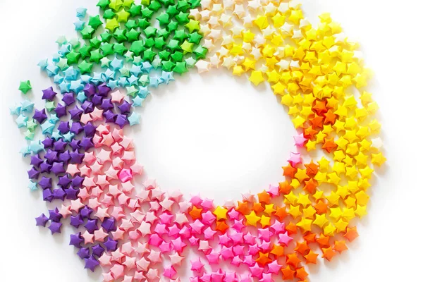 다채로운 접힌된 종이 스타 또는 프레임으로 사용 하려면 종이 접기 럭키 스타 — 스톡 사진
