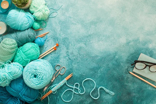 Yarn for knitting mint, blue, green, turquoise and knitting need — Stock Photo, Image