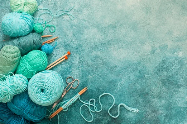 Yarn for knitting mint, blue, green, turquoise and knitting need — Stock Photo, Image