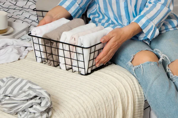 Unidentified Young Woman Blue Striped Shirt Jeans Neatly Puts Things — Stock Photo, Image