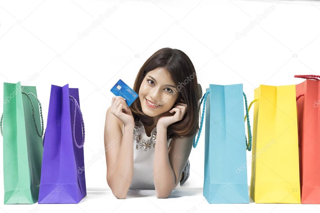 beautiful woman shopping online with credit card on white backgr