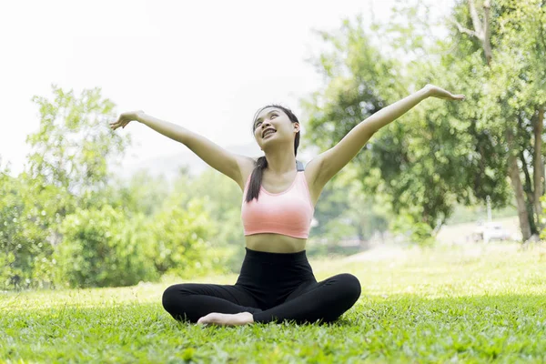 beautiful woman relax yoga in the park