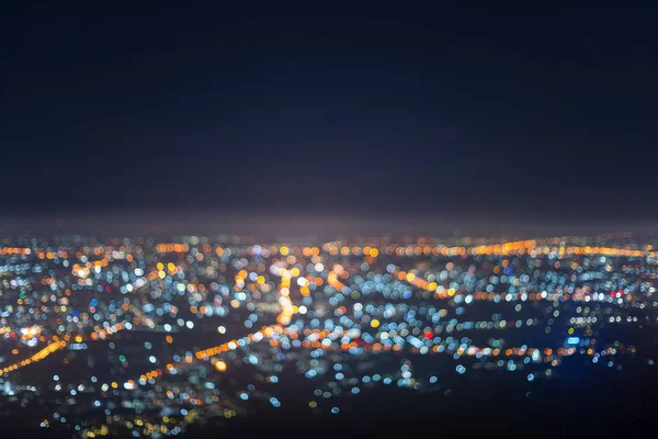 light bokeh city landscape at night sky with many stars,  blurred background concept