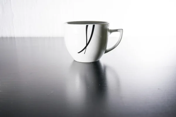 Small Abstract Porcelain Coffee Mug Espresso White Black Contrast — Stock Photo, Image