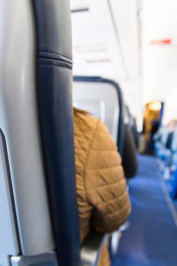 Uçak koltuklarının koltuk Isle derinliği alan Bokeh mavi Lea arkasında